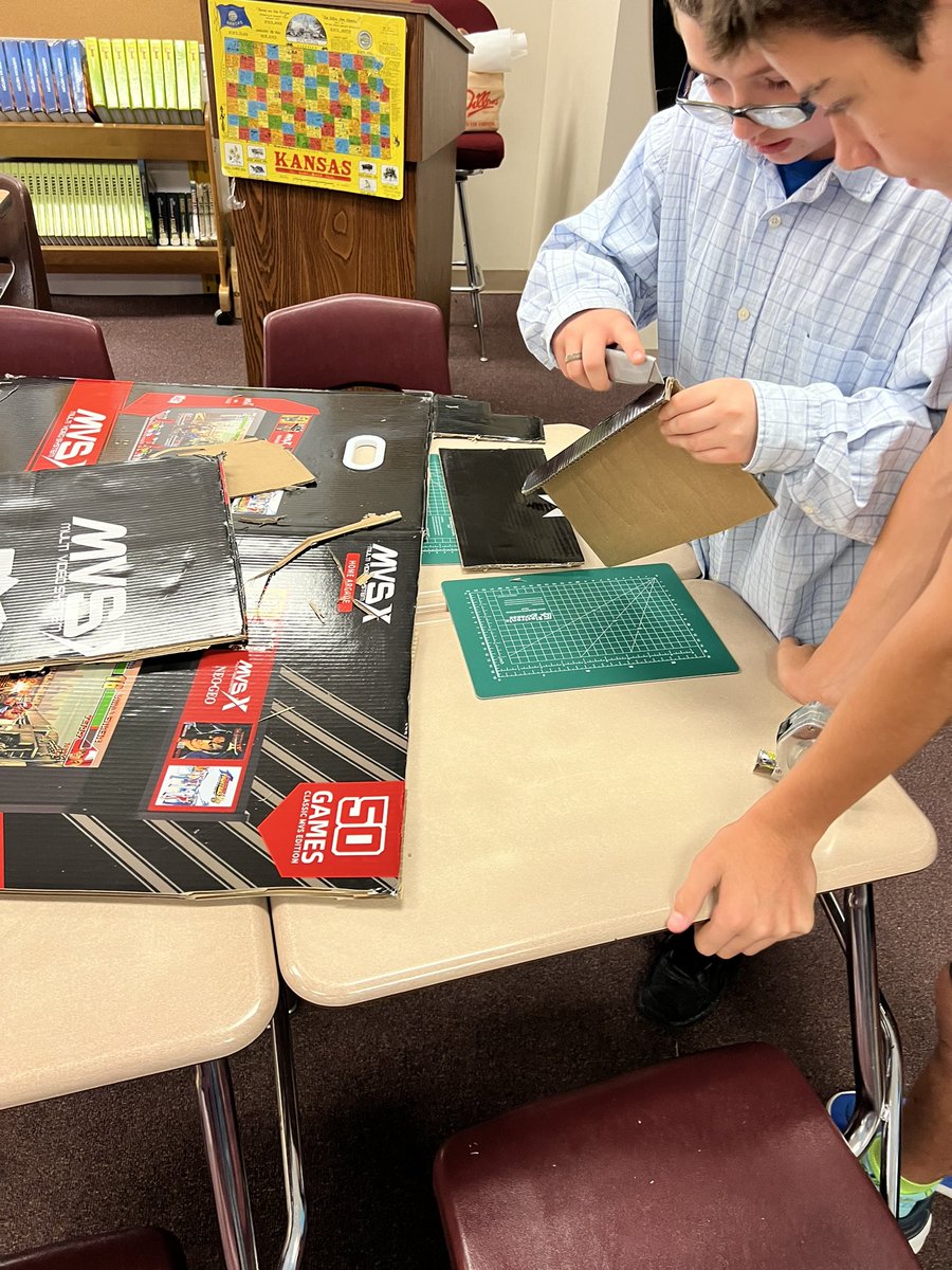 mwoods67037's tweet photo. Construction day…Breakout the cardboard and hot glue!!! Our PLTW class has started building mock-up scale model of their furniture designs. #PBL #PLTW #BPMS #Rm117 https://t.co/vJnn7EOaPc