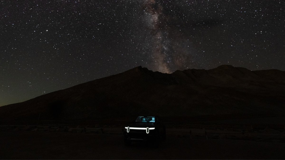 Rivian's tweet photo. Stars: The only gas-powered thing in this incredible photo by R1T owner Andrew. ✨⚡️ https://t.co/xN7x7WeB3y