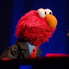 elmothinker's tweet image. suit elmo!