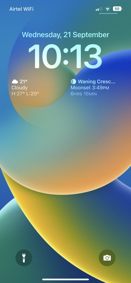 Rajkh's tweet photo. @AppleSupport when we add widgets to a wallpaper then the subject overlaps over time fonts go away, please check the screenshot 
Please consider this fix in the next update https://t.co/Ymtu7pLxEQ