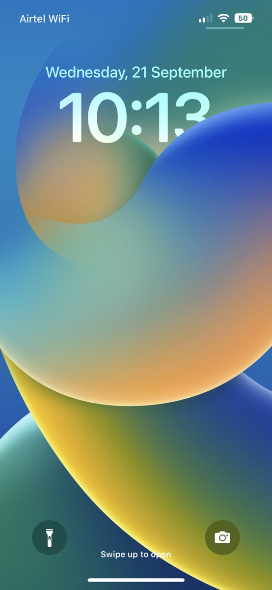 Rajkh's tweet photo. @AppleSupport when we add widgets to a wallpaper then the subject overlaps over time fonts go away, please check the screenshot 
Please consider this fix in the next update https://t.co/Ymtu7pLxEQ
