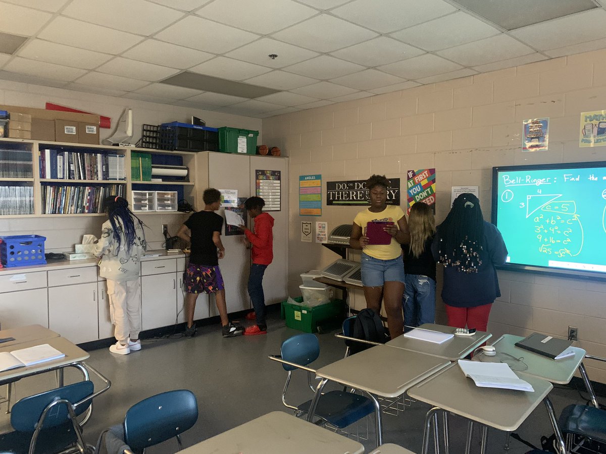 Jcrane90's tweet photo. Pythagorean Theorem Scoot activity.  Mrs. Norris’ 8th grade math students were up moving, engaged, collaborating, and having productive struggle.  @JEFCOED @CCMSCougars @Jefcoed6_12 @JessicaSilas17 @AMSTI4all https://t.co/zkTdgGFljF