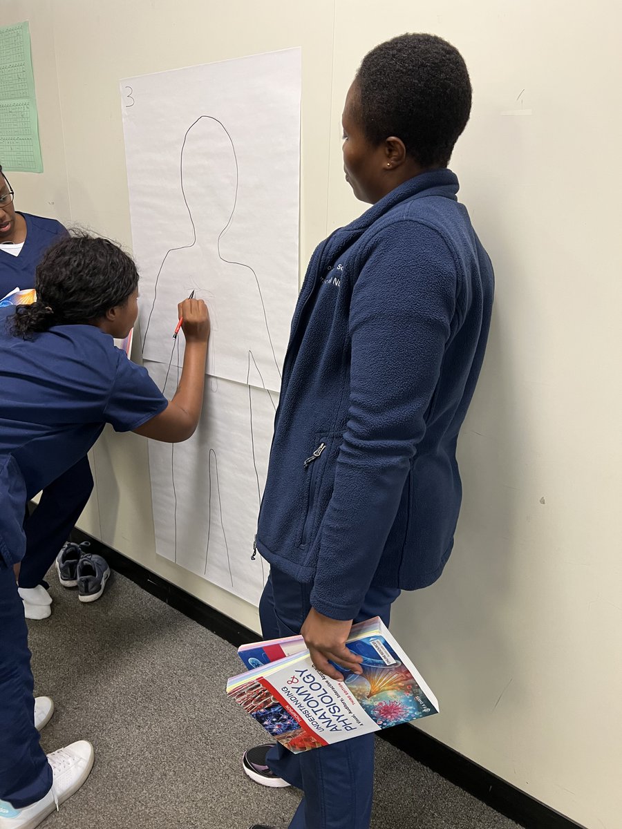 columbusadulted's tweet photo. 💙💚 Practical Nursing students test their drawing skills while in Joy Rockhold’s human anatomy and physiology class. We LOVE to see our students working together!  #ACEimprovesLives #nursingschool #lpnprogram @ColsCitySchools https://t.co/TggnJKXiYP