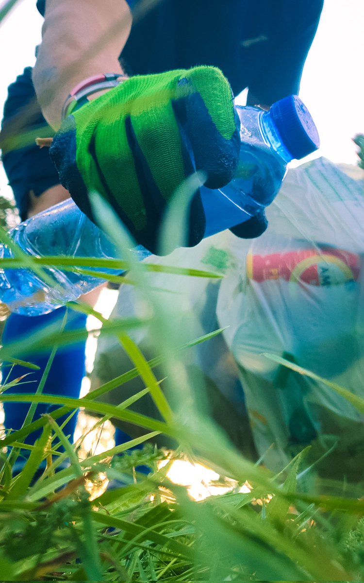 Another full single use plastic water  bottle thrown on the ground at trash. #plogging