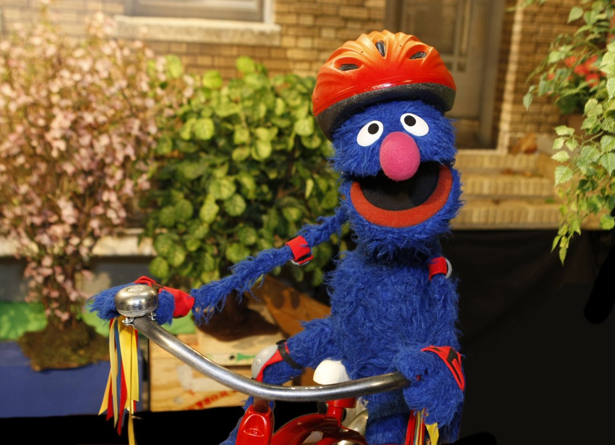 Grover's tweet photo. A helmet, knee pads, and elbow pads are very important when riding a bicycle, especially if you are accident-prone like me! https://t.co/TsSsd2P5Fl