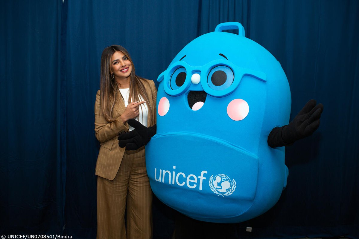 UNICEF's tweet photo. Got your back💙

UNICEF Goodwill Ambassador @priyankachopra and our new education mascot Uni have a message for world leaders at #UNGA: invest in quality education for every child. 
 
#LetMeLearn #TransformingEducation https://t.co/JJyLWceLeI