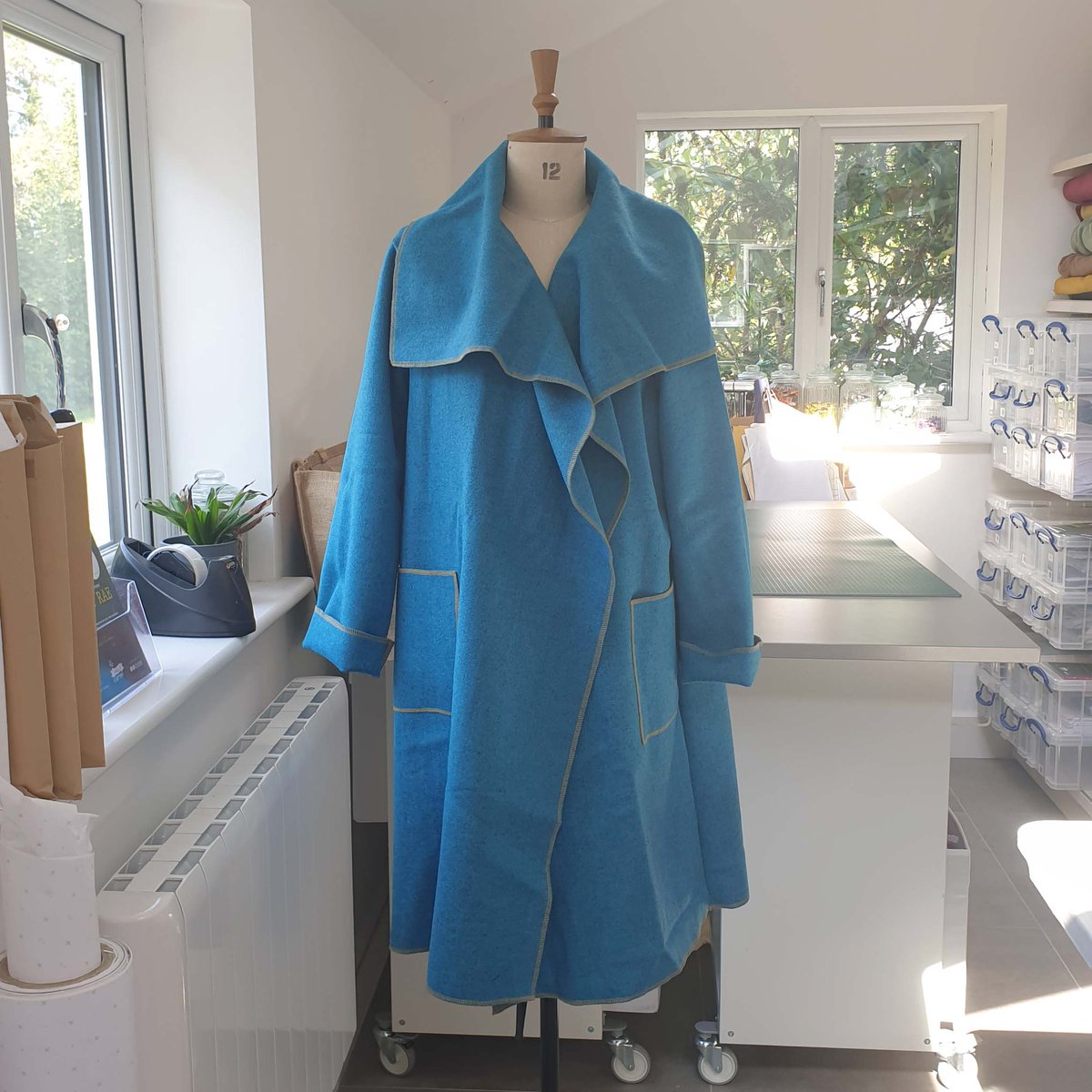 bobbinsnbuttons's tweet photo. There have been some lovely makes in classes recently. This is Maggie's first garment. A beautiful wool waterfall front coat. Mostly made on the overlocker. She chose mustard thread as a contrast to the teal. A lovely added detail. #dressmakingclasses #sewyourownclothes https://t.co/phukOsVxJK