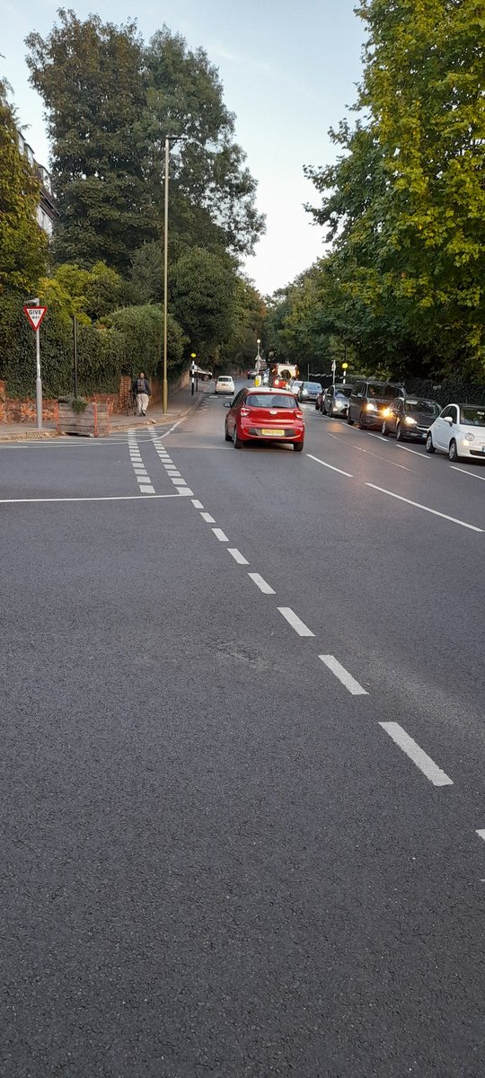 brendan_zappa's tweet photo. Hi @RantyHighwayman and @adamtranter, I hear you have views on bell junctions like the one pictured (Farnaby Rd, Bromley). Just found out @LBofBromley is planning to remove the planter which narrows the road mouth,making primary school opposite safer. My question for you is...1/2 https://t.co/ttbl386oEl
