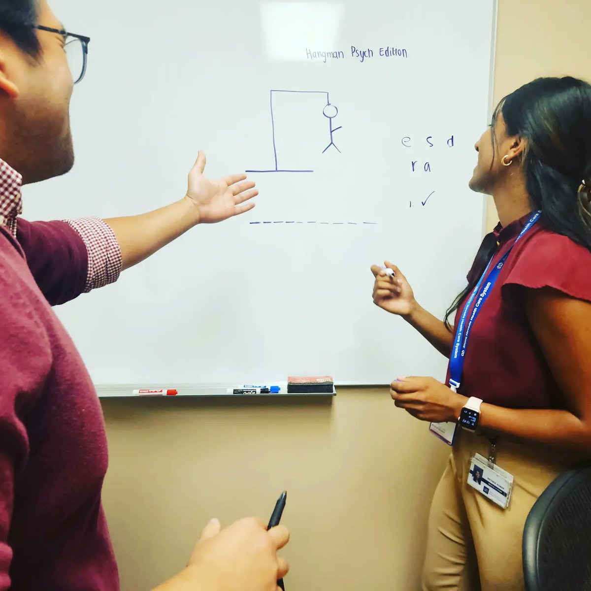 UNRPsychiatry's tweet photo. Our third year medical students study for shelf by playing Hangman:Psychiatry Edition!

One of the benefits of our program is the privilege to educate and mentor medical students who rotate on our inpatient psychiatry unit!

#inpatientpsychiatry #hangmanpsychedition #mentorship https://t.co/P7xHDg9jVu