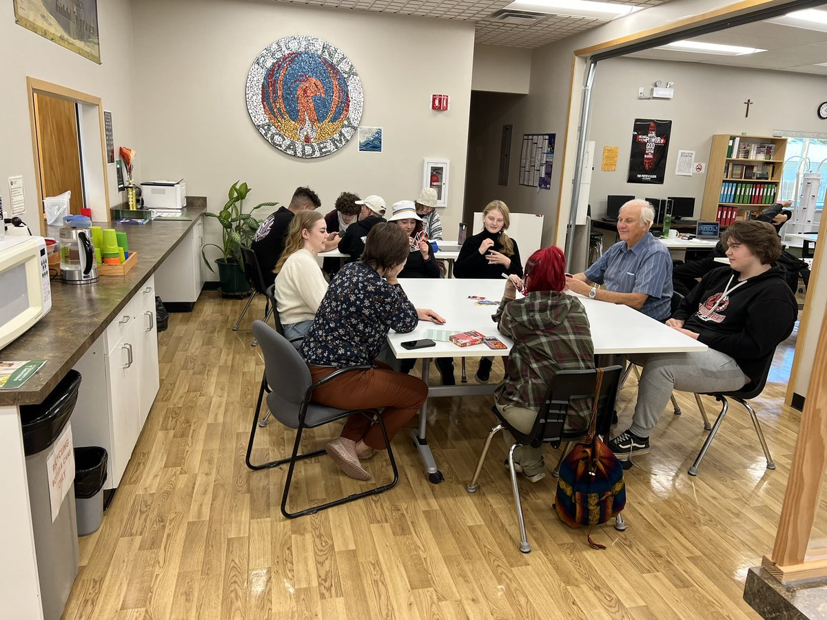 Phoenix_HTCSD's tweet photo. Deacon Lamont and Father Nestor were here this week joining our students at lunch. Faith, fellowship and fun at lunch. @HolyTrinitySD @LynnesJeff https://t.co/U85XggGrV1