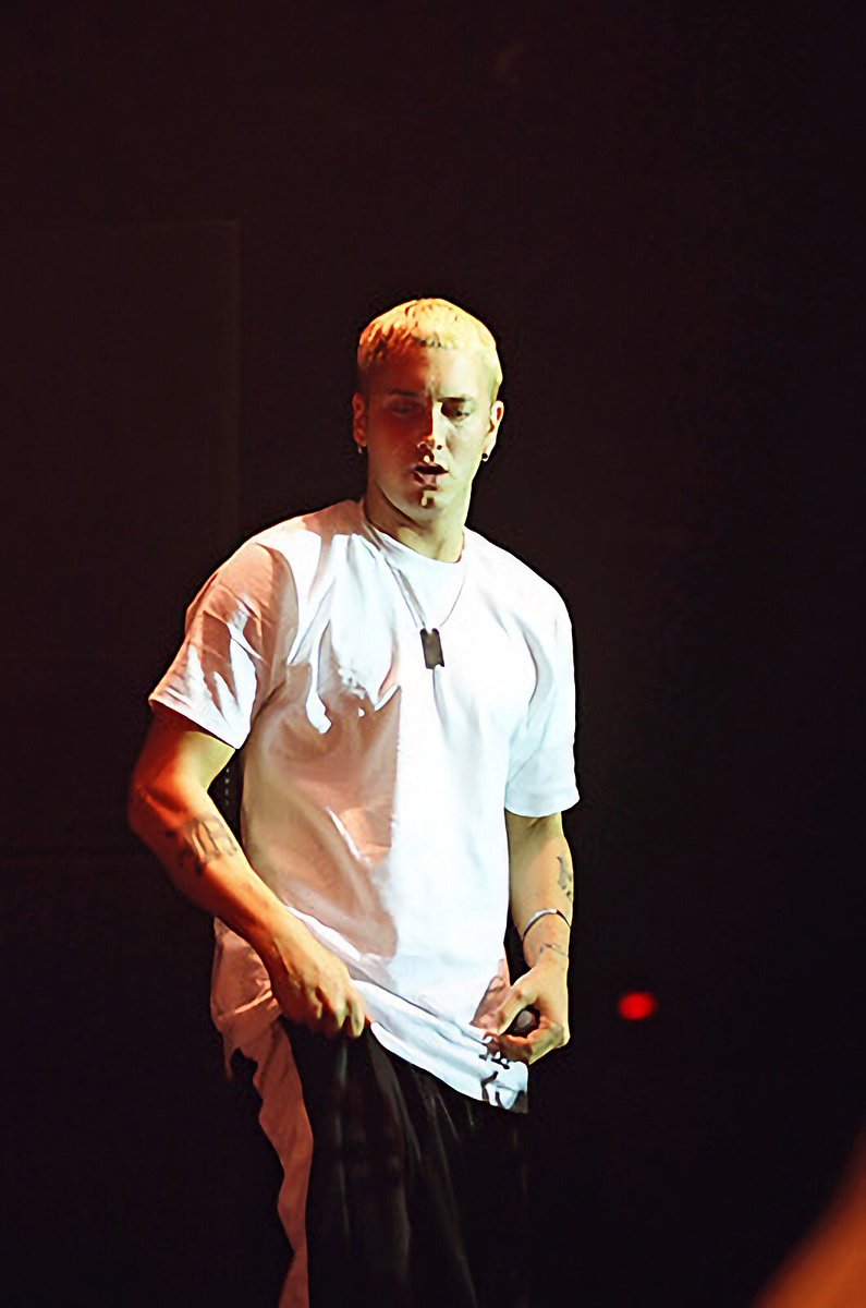 #Eminem photographed by Pierre Roussel whilst he performs at the University of Montreal at the CEPSUM centre located on the campus in Montreal, Canada on Friday, April 21, 2000.
With special guest and fellow New York rapper Pharoahe Monch. 

Photography by Pierre Roussel