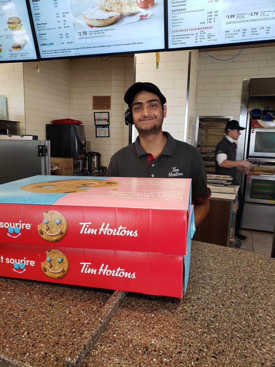KathThompson's tweet photo. Here is my @TimHortons "Smile Ambassador" today serving me up 24 Smile Cookies.  🙂 
Great team at Central Park Tim's. Staff &amp; manager thanked me for supporting #SmileCookie Week in Ottawa. 🍪❤️
Until Sept 25, the full $1 from every Smile Cookie goes to @SnowsuitFund https://t.co/OkbgU6MeoA