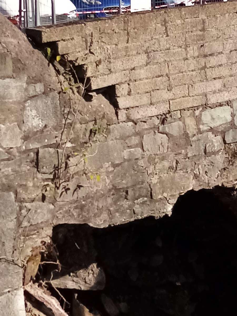 corksouthcen's tweet photo. With the return of wet weather today it wont be long now before this section falls down. Absolutely nothing has been done. #southgatebridge #wallwatch #cork https://t.co/3JHfp67LrF