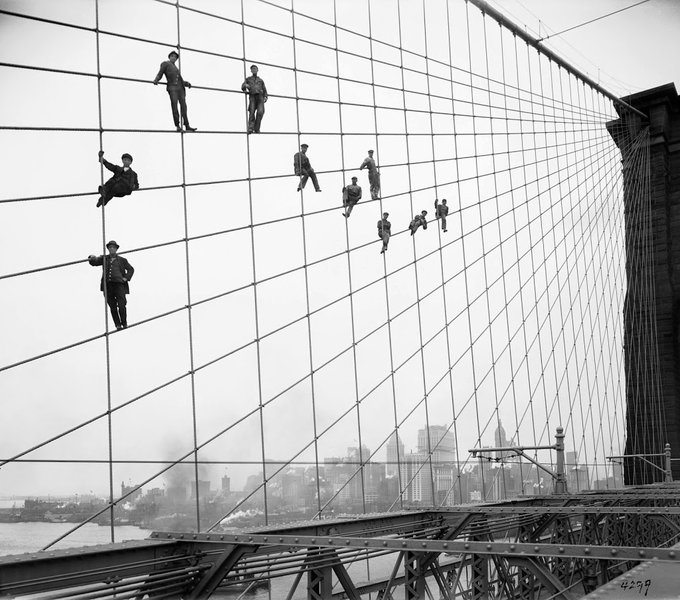 OraundR's tweet photo. Painters posing on the Brooklyn Bridge, 1910s. Photograph by Eugene de Salignac. https://t.co/QFvs2ntcek