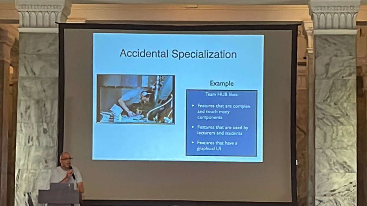 andreasschliep's tweet photo. #Less2022 @basvodde is again emphasizing that #LeSS optimizes for learning with the principal trust in people. 

Feature teams are not supposed to specialize on themes or favorite features. 

Team interdependence means sharing work and learning. https://t.co/KccFNTyUrd