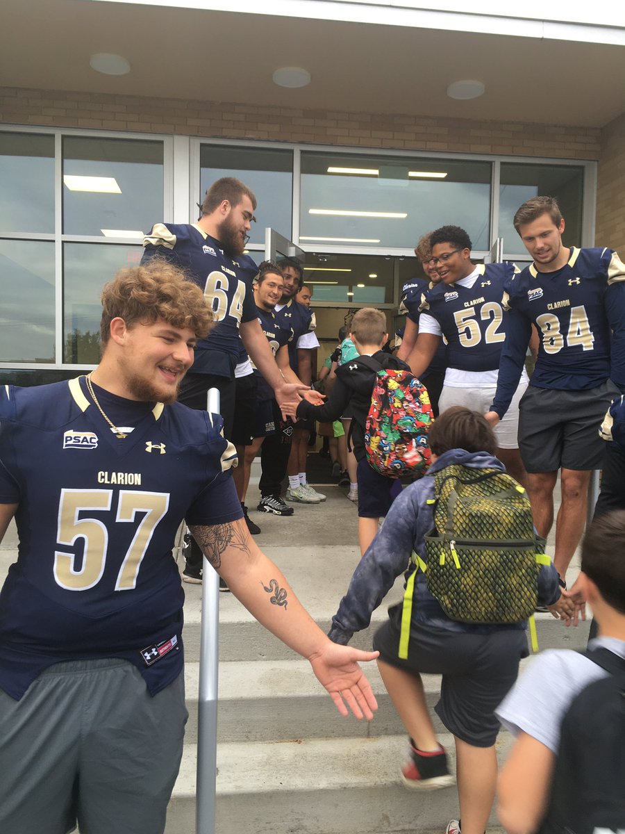 ClarionFootball's tweet photo. Our players and staff headed to Clarion Limestone Elementary to greet future Golden Eagles as they head to school! 🏫 📚 ✏️ 

#WingsUp https://t.co/0vz2ThKMFk