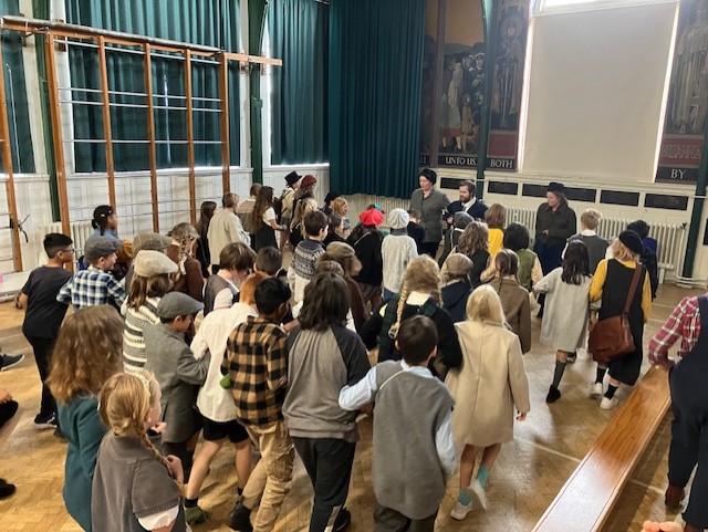 Year 6 are having a day of World War 2 experiences. They were evacuated with their gas masks, made carrot cookies and they even did the Lambeth Walk at the end of the show by <a href="/LondonRainbow/">Rainbow Theatre London</a> What a fantastic day!