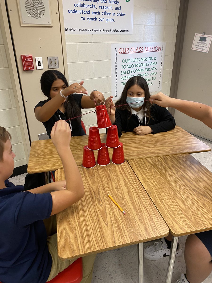 MrBurtch's tweet photo. My student leaders honed their #synergy skills with a cup pyramid building challenge! @IMS_Indians https://t.co/VzCDN0a35c