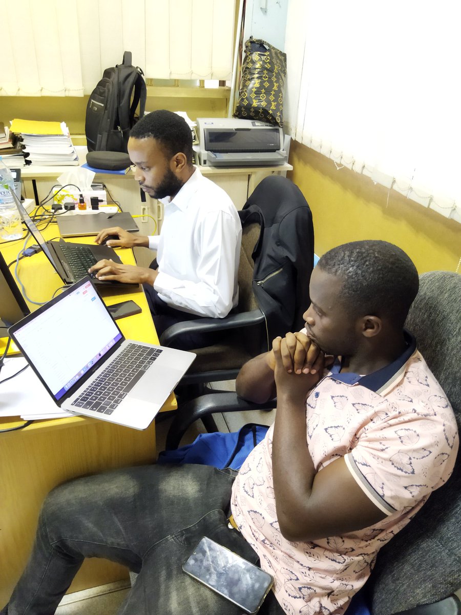 clicyourworld's tweet photo. @mbonye1 #clicyourworld CTO and Ivan Lumu IT Manager ABC Bank Uganda busy with final system setup to enable cash deposits and withdrawals at the bank's tellers from their ABC branded digital wallet, powered by https://t.co/9FZ9o4udOs and #Stellar https://t.co/6ZXQCZXFlu