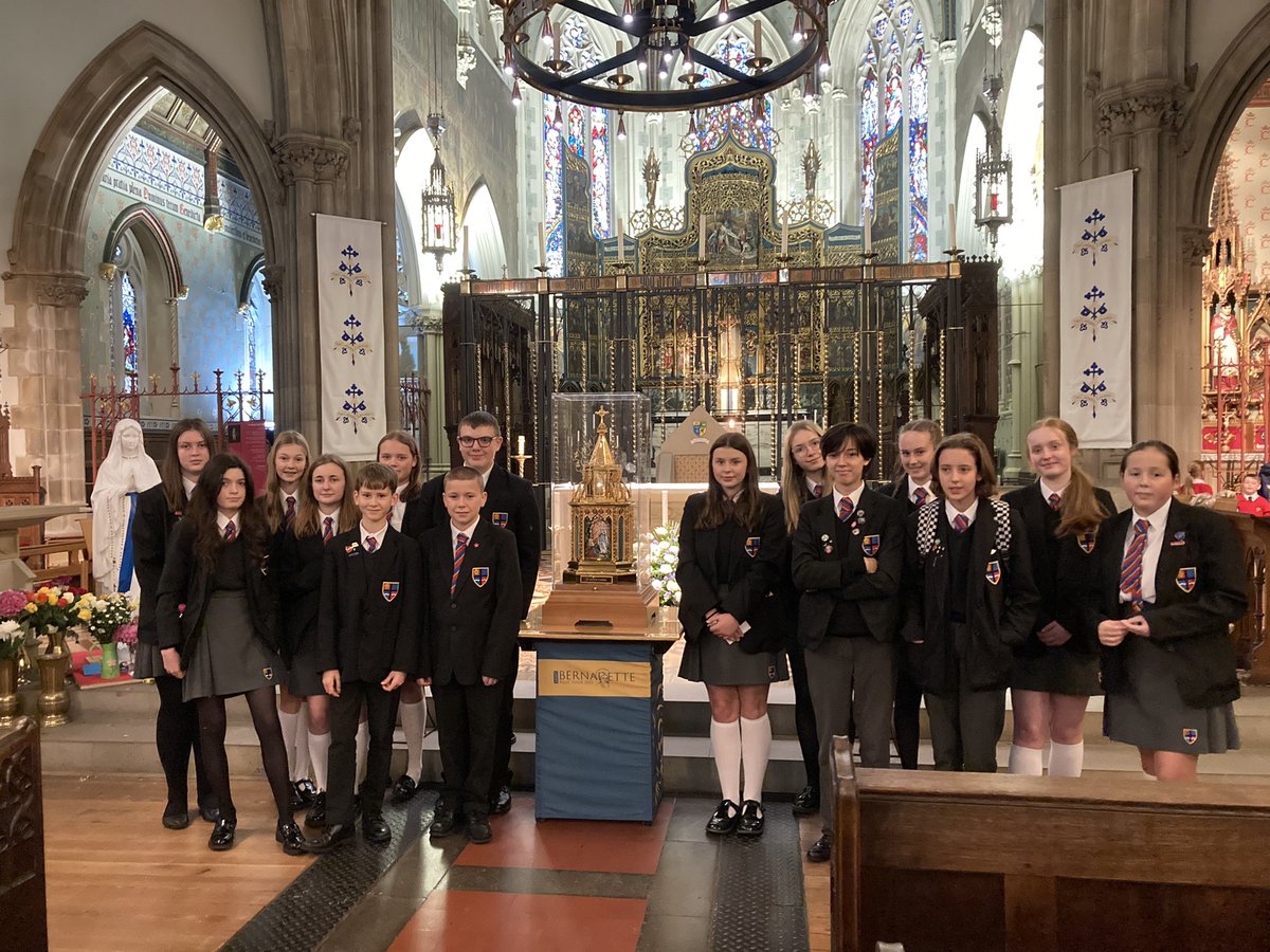 CACHSChaplaincy's tweet photo. Some of our pupils made the mini pilgrimage to @lanccathedral today to see the relics of @StBernadetteUK 💙 we left her some flowers, our intentions, and prayed a decade of the rosary with @SMCA_Chaplaincy #relictour https://t.co/Mo8O13tuKN
