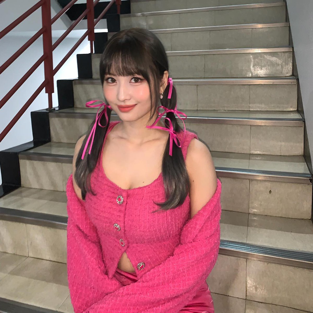 I am representing my spirit in pink during the promotion time. I am sitting on familiar stairs and I beg you to already know where I am doing this promotion.