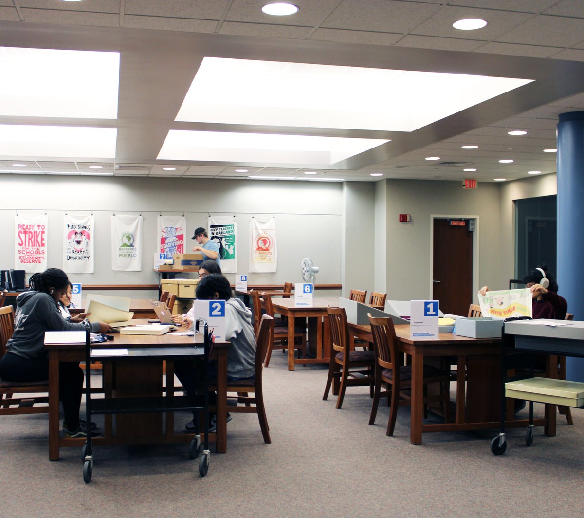 UConnArchives's tweet photo. This rain didn’t deter our patrons! Undergrads, fellows, and out-of-state researchers are staying dry in the John P. McDonald Reading Room. #whatstorm #wontbedetered #archivesareforeveryone https://t.co/mvngyrEg7b