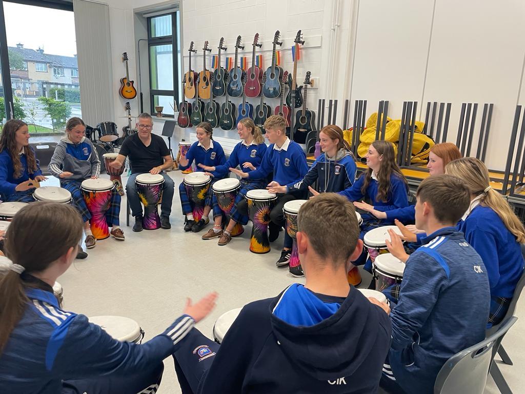 ColaisteIosaef's tweet photo. Smiles all round again today. Students were buzzing. Huge thank you to Dave. TYs and LCAs enjoyed the workshop today… Ms Henebry may have also snuck in her 1st year music taster class to sample the drums 😂 #groovyhands #davemorrissey https://t.co/fZpnyLTBo7