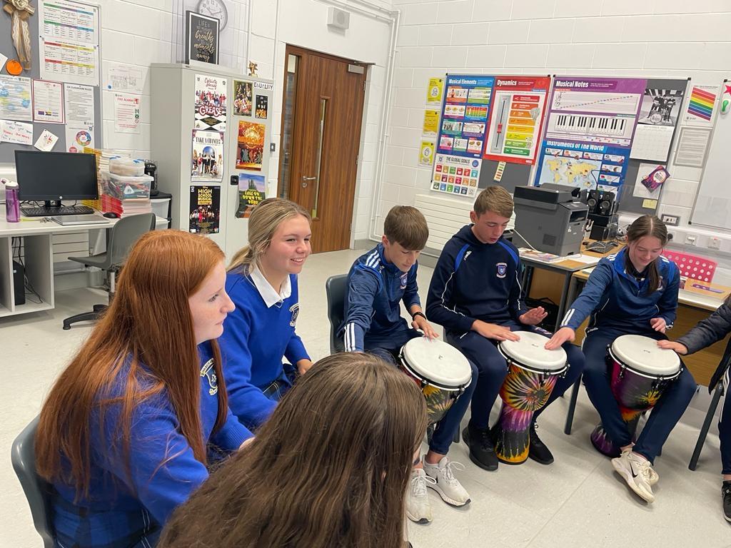 ColaisteIosaef's tweet photo. Smiles all round again today. Students were buzzing. Huge thank you to Dave. TYs and LCAs enjoyed the workshop today… Ms Henebry may have also snuck in her 1st year music taster class to sample the drums 😂 #groovyhands #davemorrissey https://t.co/fZpnyLTBo7