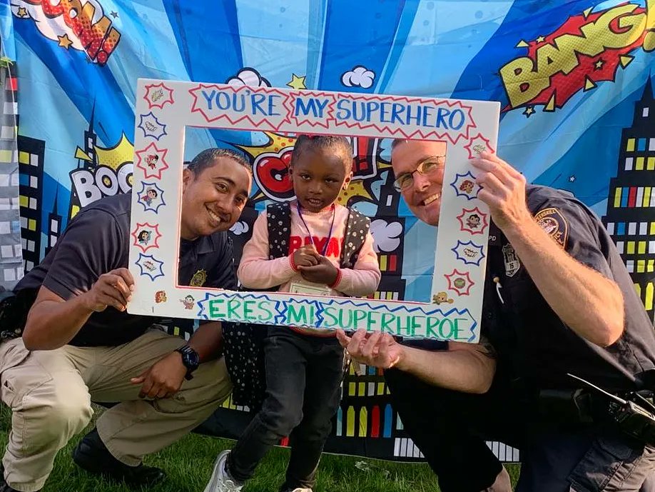 peekskillpolice's tweet photo. Just a couple of our superheroes here! PO Jones and PO Lalindez celebrating back to school with our Uriah Hill students.💙 

#CommunityPolicing 
#PeekskillPolice https://t.co/BTQ0fzqtu1