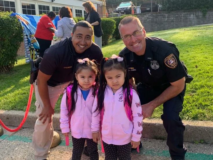 peekskillpolice's tweet photo. Just a couple of our superheroes here! PO Jones and PO Lalindez celebrating back to school with our Uriah Hill students.💙 

#CommunityPolicing 
#PeekskillPolice https://t.co/BTQ0fzqtu1