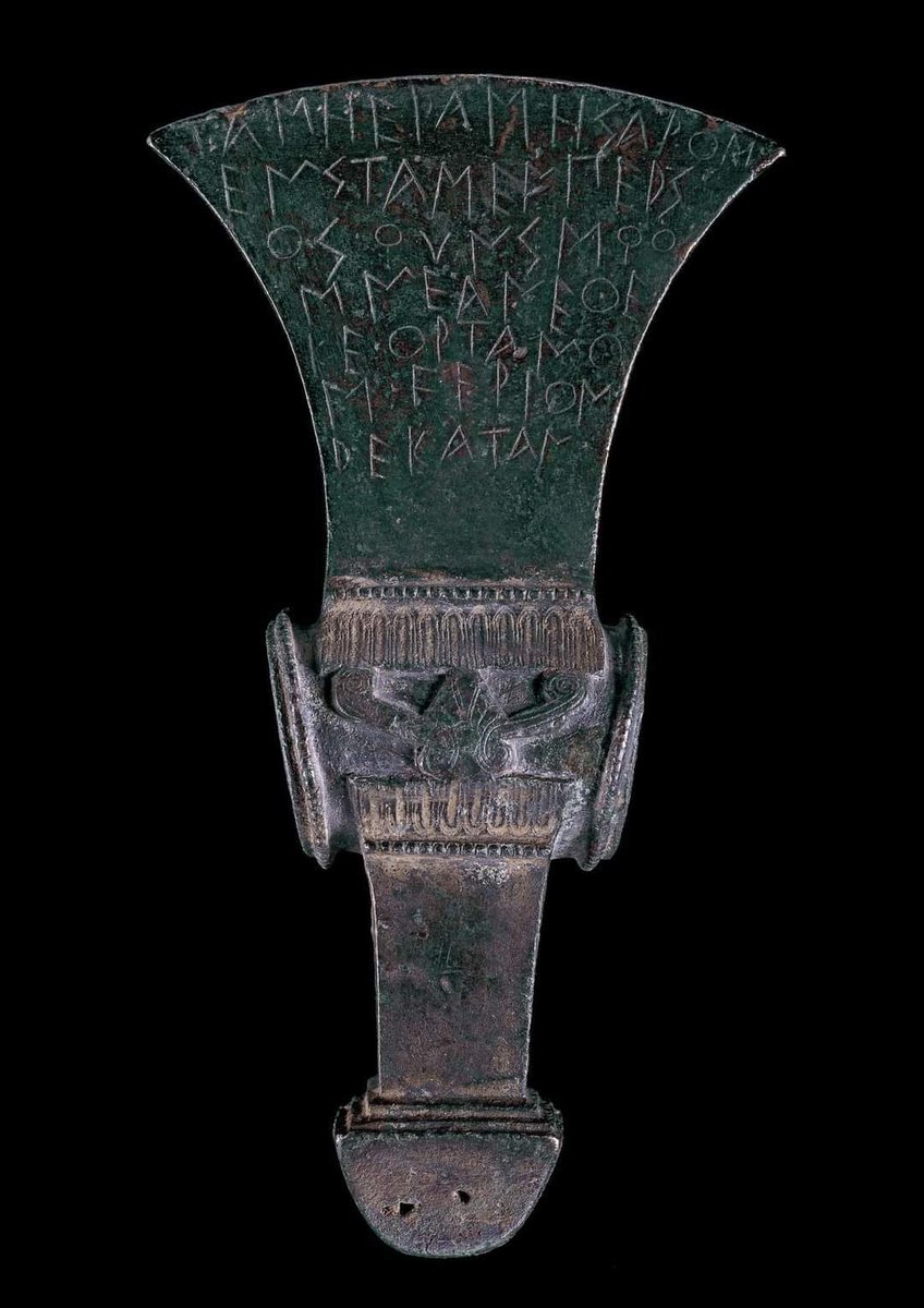 Bronze ceremonial ax (520 BC), head decorated with religious dedication, found in Sybaris, Great Greece.

British Museum