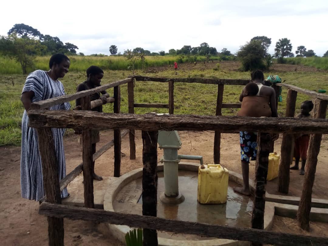 Gulu_Mission's tweet photo. Who needs clean water? Everybody! The Vocational Training Centre borehole being utilised by the community, meaning clean water and less time spent, mainly by women and girls,  walking long distances for water each day. #Result https://t.co/Yiv0g4R6UX