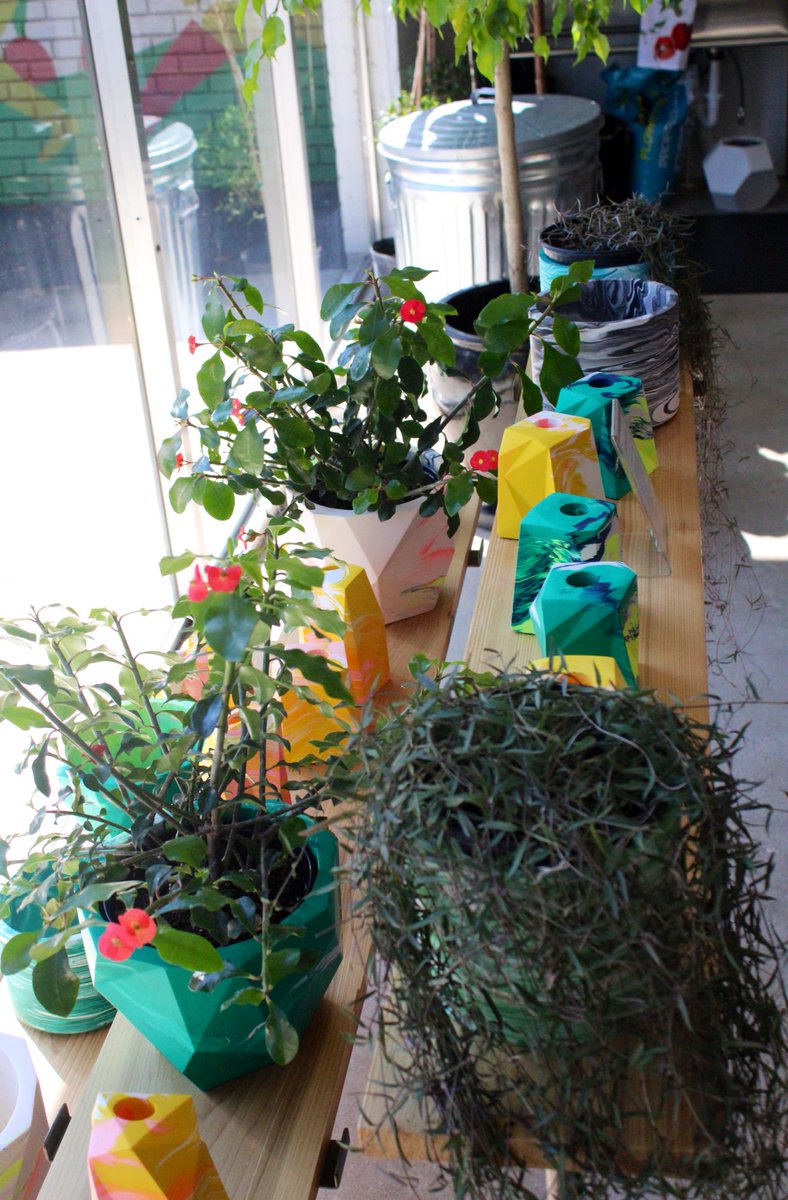 Sarah_Donehoo's tweet photo. More from @MetalandPetal: the shades of green from the plants and furniture on display add organic energy in the front room. #contemporary jesmonite vases from UK-based #SmallBusiness Misshandled are for sale, one of the several artisan products that the retail shop carries. https://t.co/8AEYJniJwj