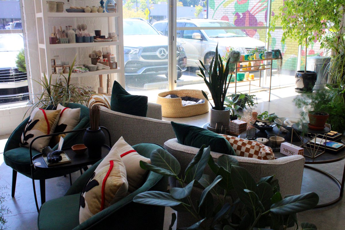 Sarah_Donehoo's tweet photo. More from @MetalandPetal: the shades of green from the plants and furniture on display add organic energy in the front room. #contemporary jesmonite vases from UK-based #SmallBusiness Misshandled are for sale, one of the several artisan products that the retail shop carries. https://t.co/8AEYJniJwj