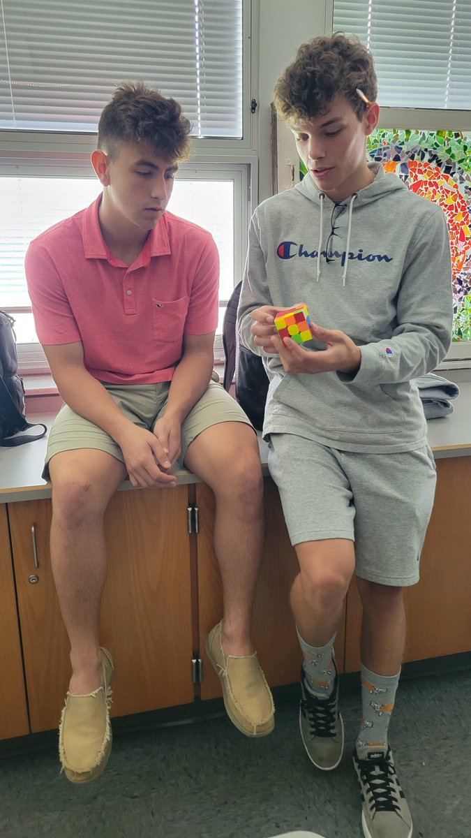 LatrobeHighPost's tweet photo. Trending: Capture the Rubik's cube. Louie Amatucci seeks advice from Noah Guidos in this brainstraining competition. These boys strategize to move each part indepedently...and go for the W. #GL #RubiksCube @ErnoRubik #speedcubers https://t.co/ZdQfMxRHbL