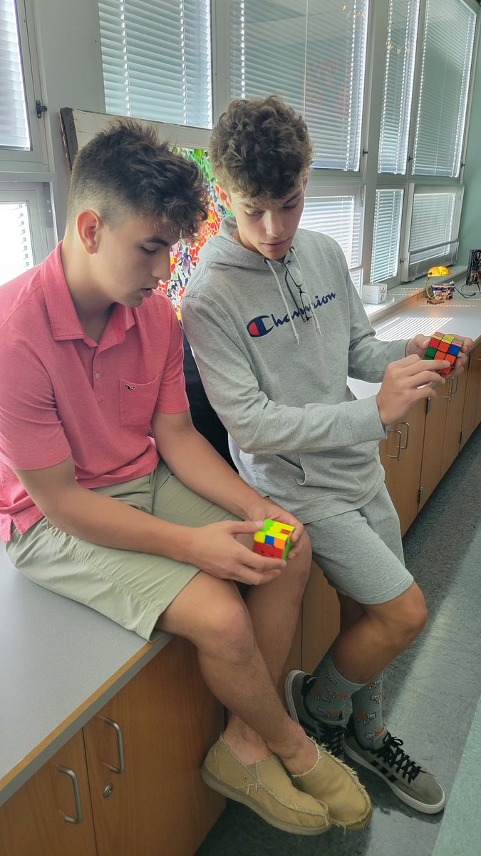 LatrobeHighPost's tweet photo. Trending: Capture the Rubik's cube. Louie Amatucci seeks advice from Noah Guidos in this brainstraining competition. These boys strategize to move each part indepedently...and go for the W. #GL #RubiksCube @ErnoRubik #speedcubers https://t.co/ZdQfMxRHbL