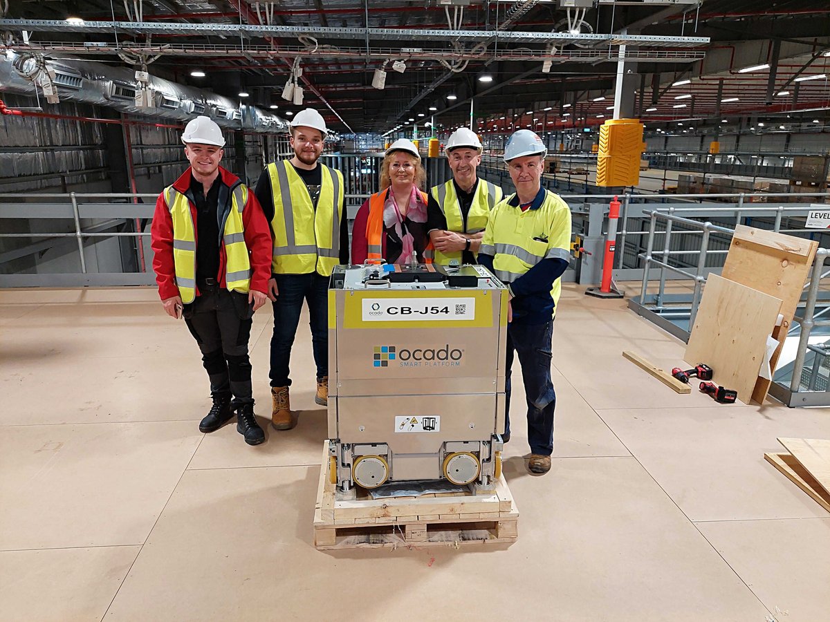 OcadoEng's tweet photo. There's a lot of excitment at the Sydney Customer Fulfilment Centre… The first 500 series bots have arrived!

A huge congratulations to all the teams who have made this possible 👏 https://t.co/y1xgmnRssS