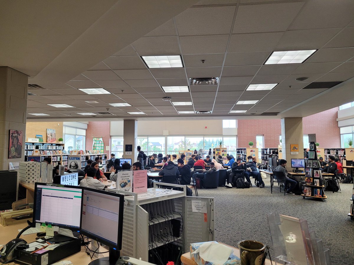 Ms_St_Aubyn's tweet photo. Another jam packed lunch hour in the #LASSLLC!  I definitely missed having students back here in person. Libraries are the ❤️ of a school 🥰😍🤩.  @LASSinspires https://t.co/gN1bwNpOCZ