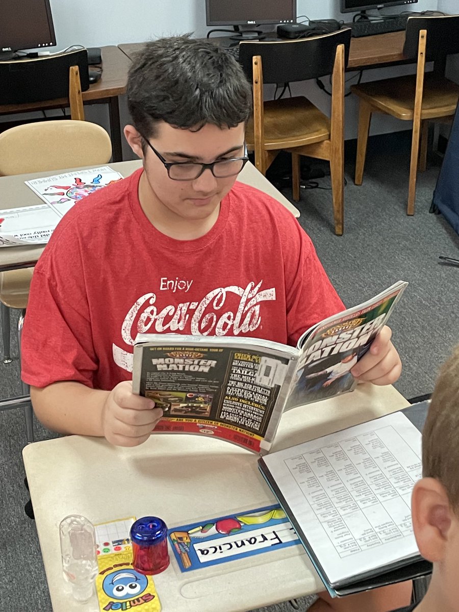 R_Schugg's tweet photo. Dom has been caught reading his library book!  😎😊📕⁦@MissPaddickCMS⁩ ⁦@WEARECMS25⁩ ⁦@canon_mac⁩ https://t.co/Ddb4oFZzea