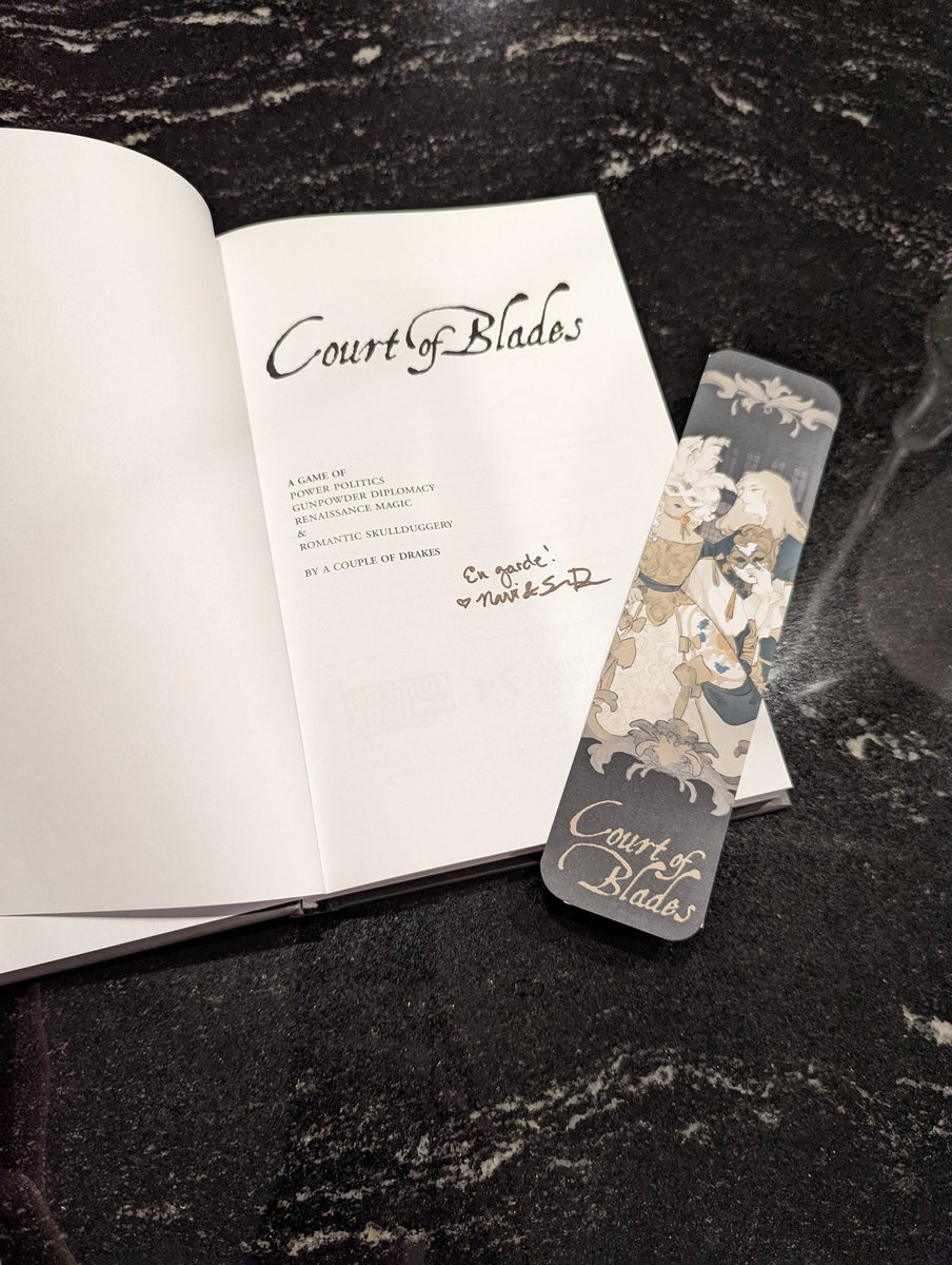 Check out this dashing little number that showed up in my mailbox.

So excited for this!! Thanks <a href="/NaviMusing/">Navi Drake + Badass Indie Games 🧙‍♂️</a> and <a href="/DrakeandDice/">Shawn Drake, Indie Warhorse. 🧙‍♂️</a>!