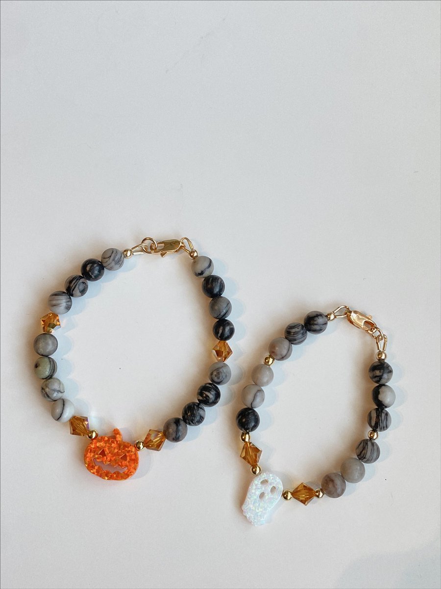 mommy &amp; me set 🎃👻✨
made with 14k gold filled findings, black silk jasper beads, topaz swarovski &amp; opal pumpkin &amp; ghost ✨ $40 + $3 shipping 🖤