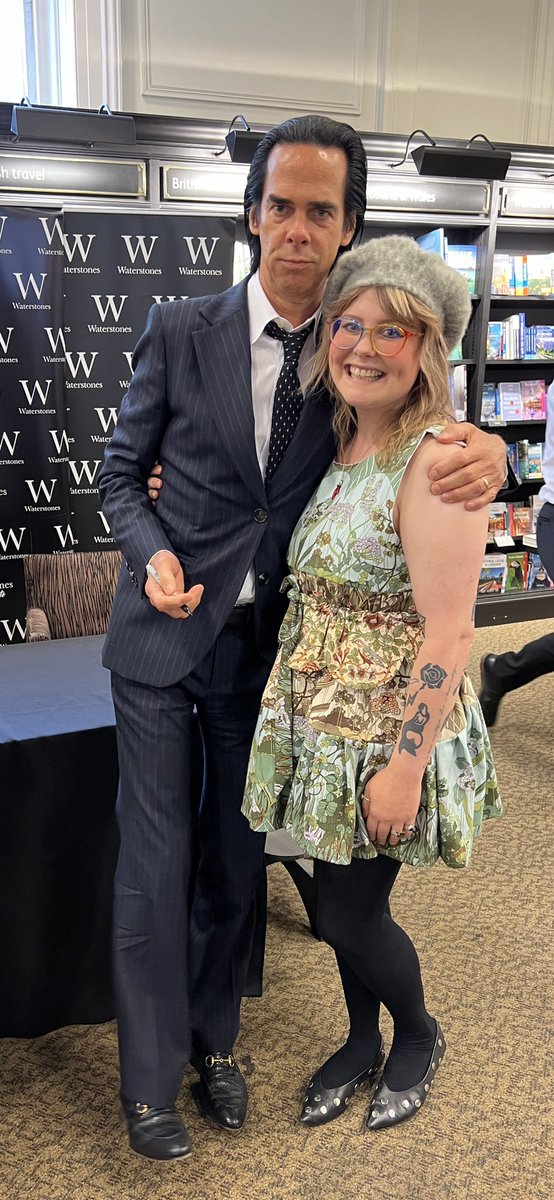 TheFruitMoth's tweet photo. Yesterday was one of the best days of my life so far, meeting my hero @nickcave in the dress I made especially for the occasion. Just incredible. Had to get my Lovely Creatures tattoos in shot ♥️😂 https://t.co/QgcyaCVJbq
