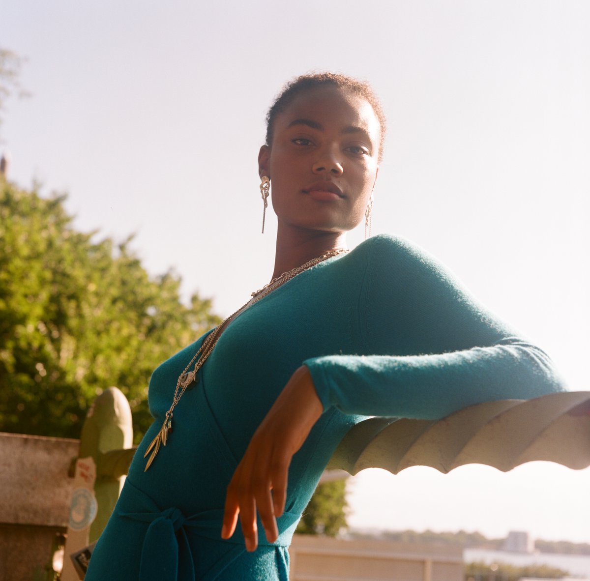 DVF's tweet image. Everything looks better on film. 🎞 The Astrid is back in electric blue!