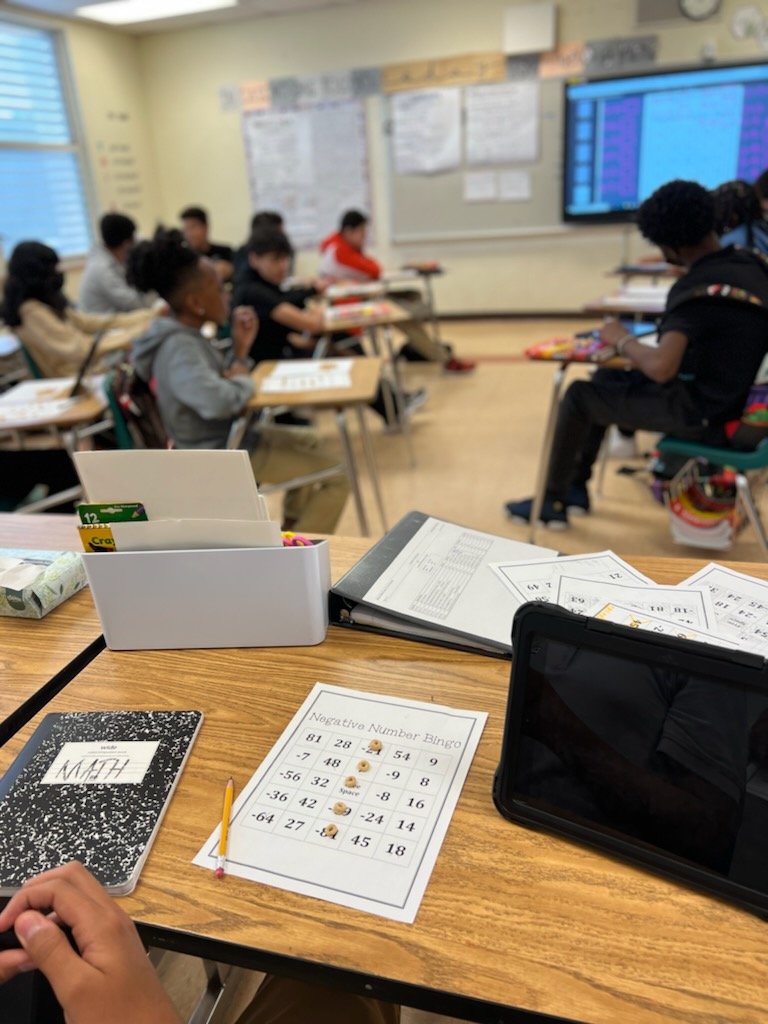 ShenandoahMS's tweet photo. Math + Cheerios = Fun time! Ms. Sanz's Algebra 1 students played Bingo so students could polish their skills on the four operations with integers. After eight bingos were called, they ate all the Cheerios! #SMSMath @MDCPS @MDCPSCentral @SuptDotres @miamimagnets https://t.co/7weMpZ4Gqq