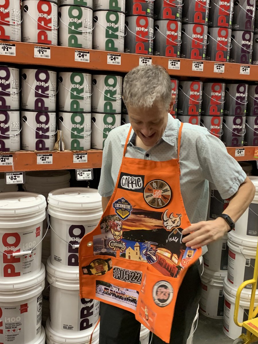 Carrie sporting her customized new apron. Gotta love when the Boss is having fun.