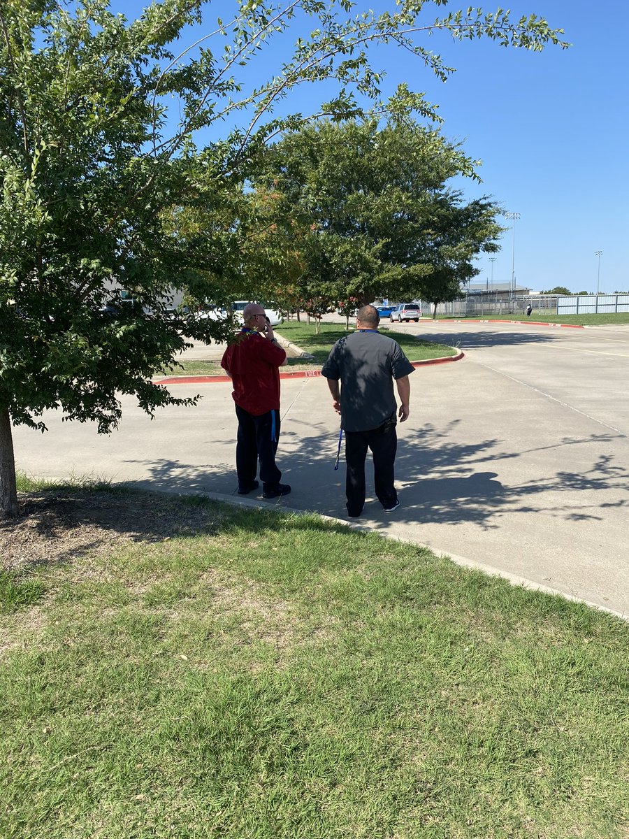 Working the traffic flow and trying to catch the shade!! Mr Gunter needs to make sure to keep things moving and keep traffic from backing up. #mrmitchellneedsahat #mrgunterismyhero #shadetree <a href="/BNick33/">Brian Nickel</a> @LB_Reinhart <a href="/SHSCCOffice/">Mr. Mitchell</a> <a href="/SValeCounseling/">Jaymie Batten</a> <a href="/Sunnyvale_HS/">Sunnyvale High School</a> <a href="/SunnyvaleISD/">Sunnyvale ISD</a>
