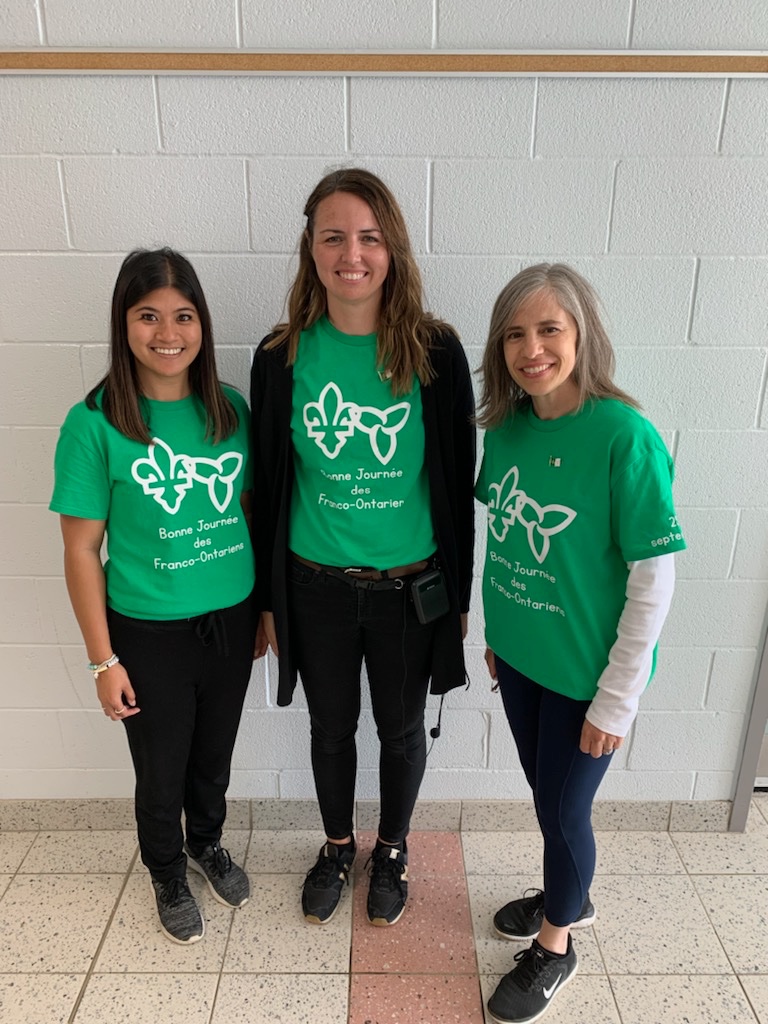 Mme_LePage's tweet photo. We celebrated “La journée du drapeau franco-ontarien” with a beautiful raising of the flag ceremony led by our talented students. @StJohnBosco_CS https://t.co/H133tq8LmB