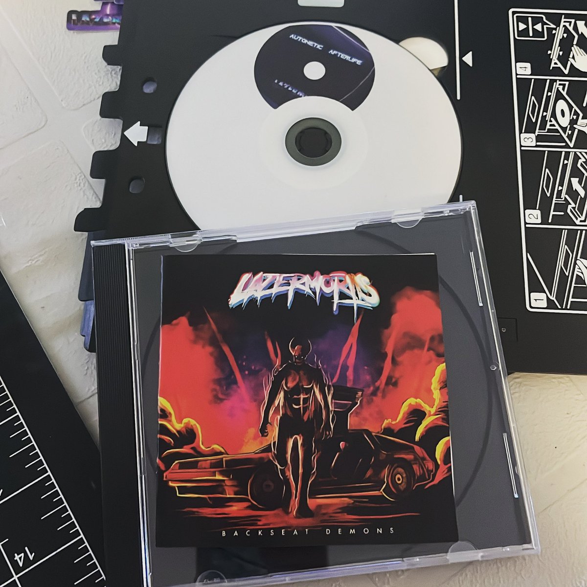 Making merch haaaaas been a rough go 😂😅😭 I’d like to publicly thank my husband for putting up with me having a meltdown over numerous failed Staples attempts to reprint Backseat Demons…