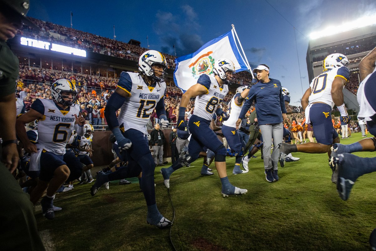 Photos from <a href="/WVUfootball/">West Virginia Football</a>'s win over Virginia Tech posted at bit.ly/3xLsi84