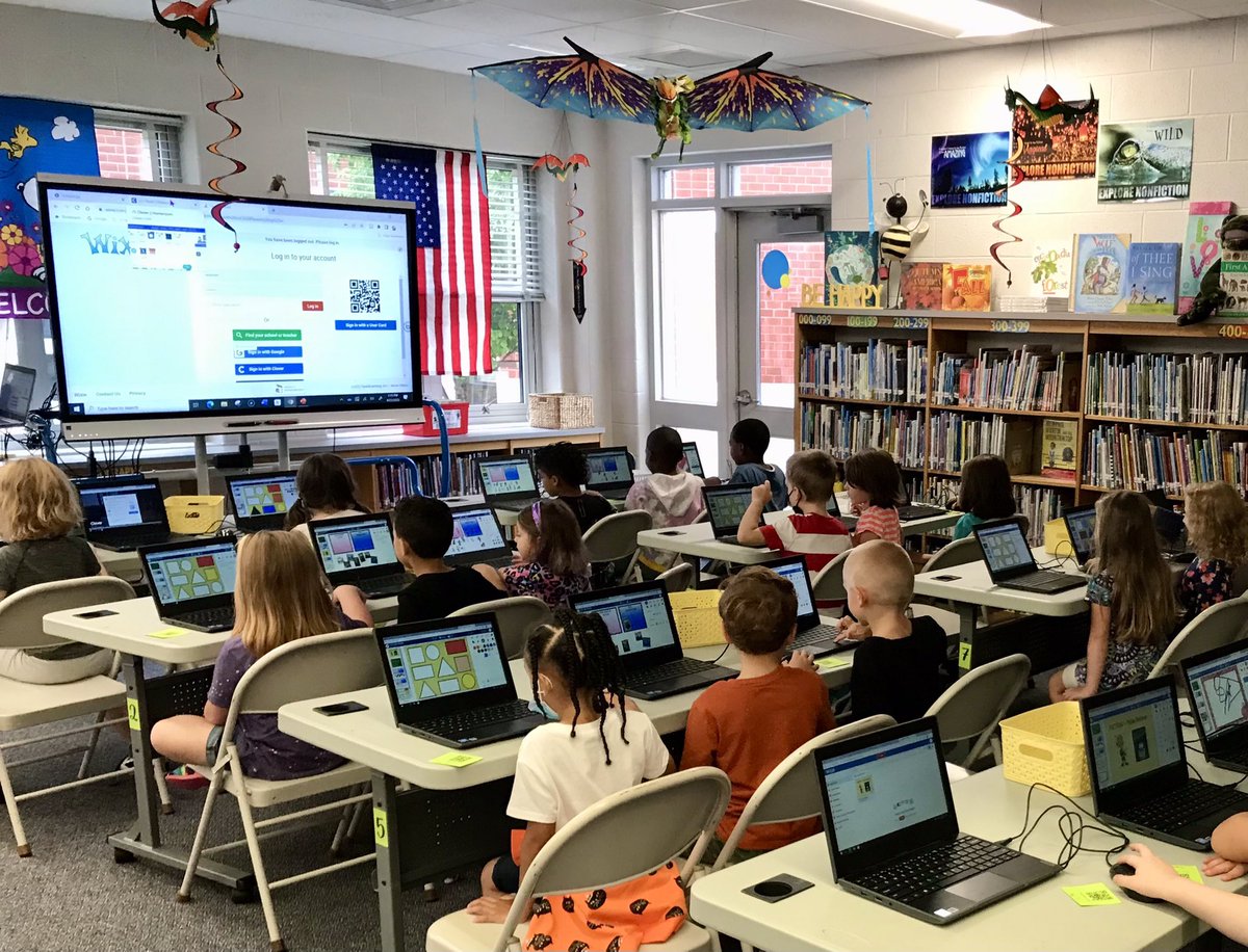 VerlichMj's tweet photo. Kindergarten students using Wixie and laptops in the library for the first time. This K class rocked Wixie!       PS- Our new furniture is on the way.😆  #WixieRockStars #DowellHuskies #NewSchoolYear #furnituredelay https://t.co/FNcJzlQBbf